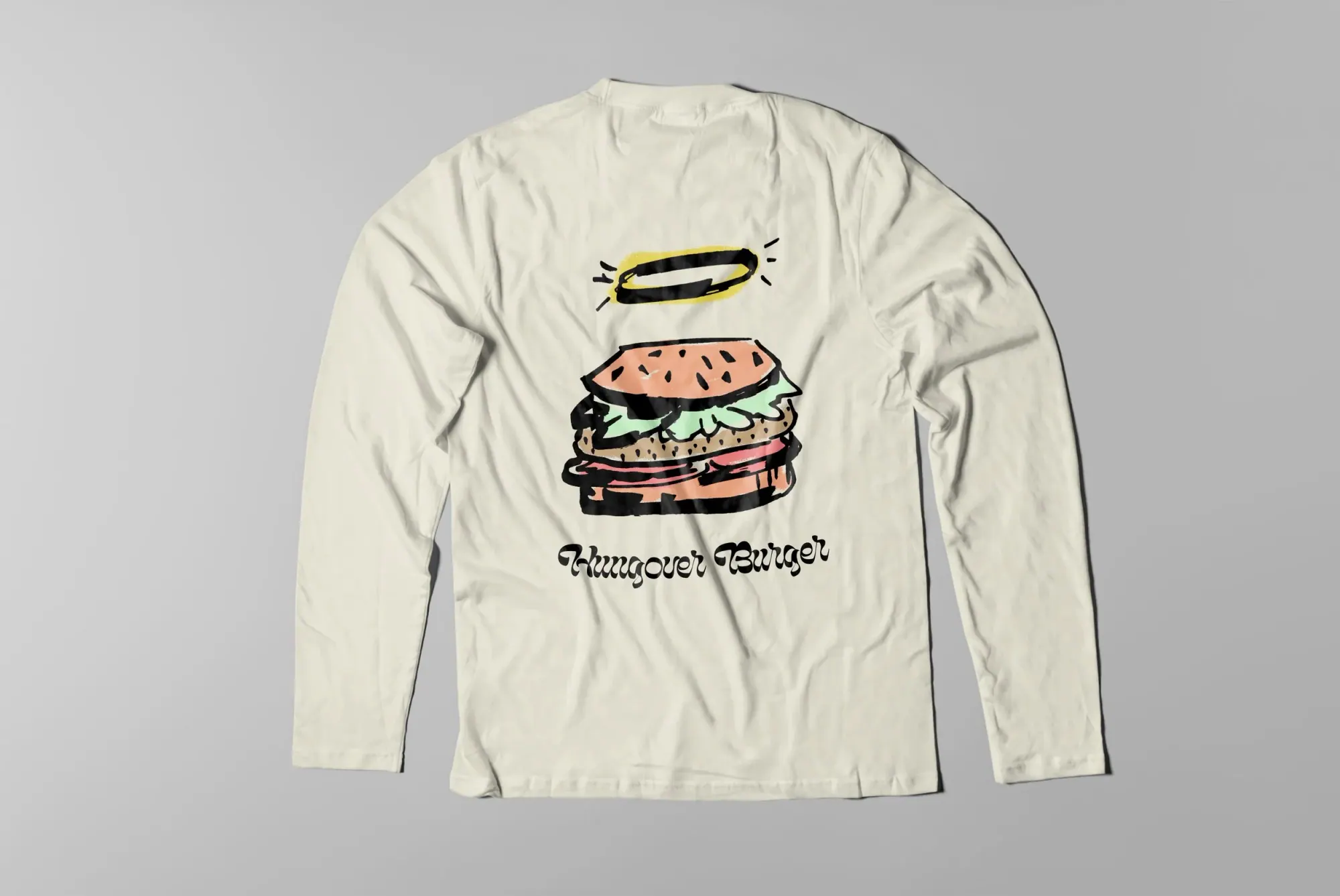Veste blanche avec un dessin de hamburger stylisé et l'inscription « Hunger Burger » en dessous.