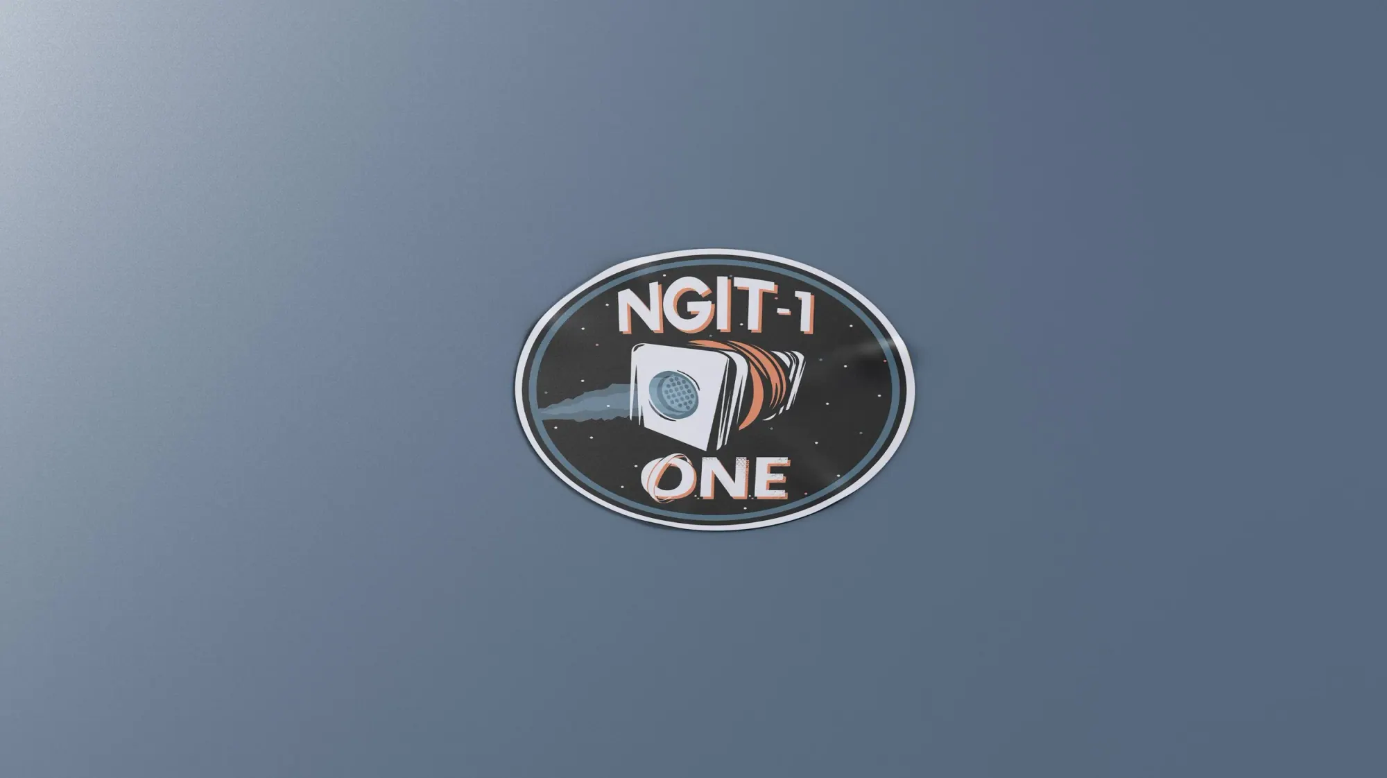 Insigne de la mission spatiale NGIT-1, illustrant un module spatial avec un fond étoilé.